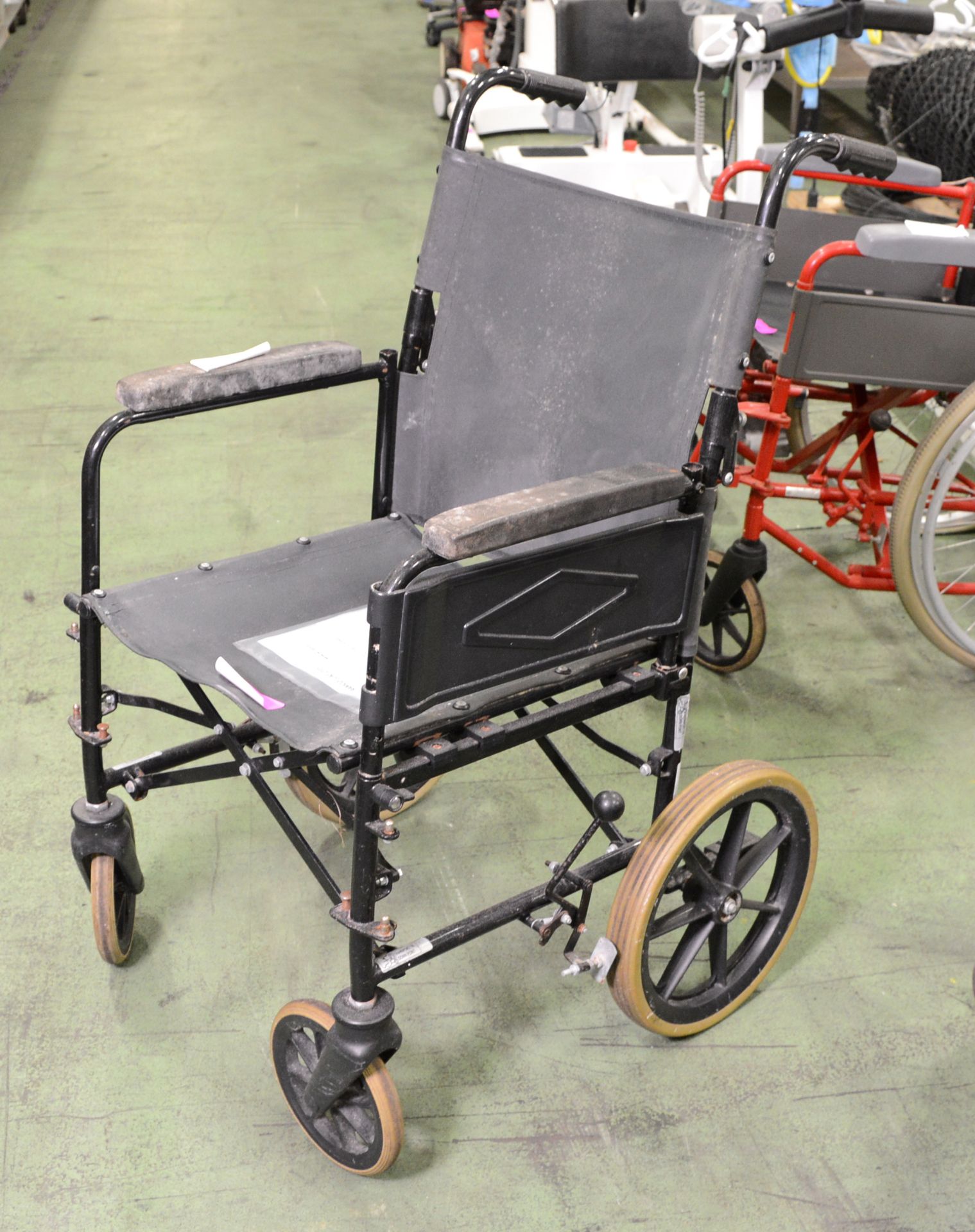 Folding Wheelchair - No footrests.