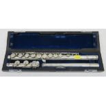 Muramatsu flute with case. Serial number: GX82024. Please note that this item is sold as