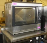 AS SPARES OR REPAIRS - Roitisserie Oven on table