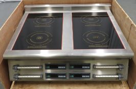 Heavy duty four zone induction countertop range, 3 phase electric, new