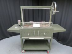 Commercial Argentinian-style charcoal grill with motorised spit