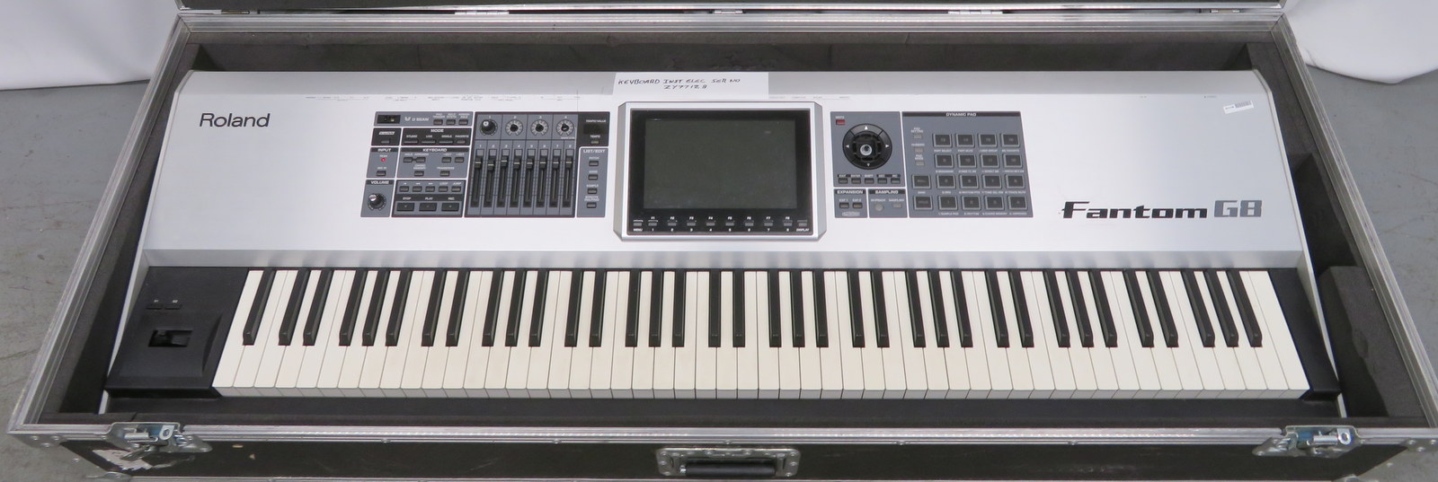 Roland Fantom G8 keyboard in flight case. Serial number: ZY77128.