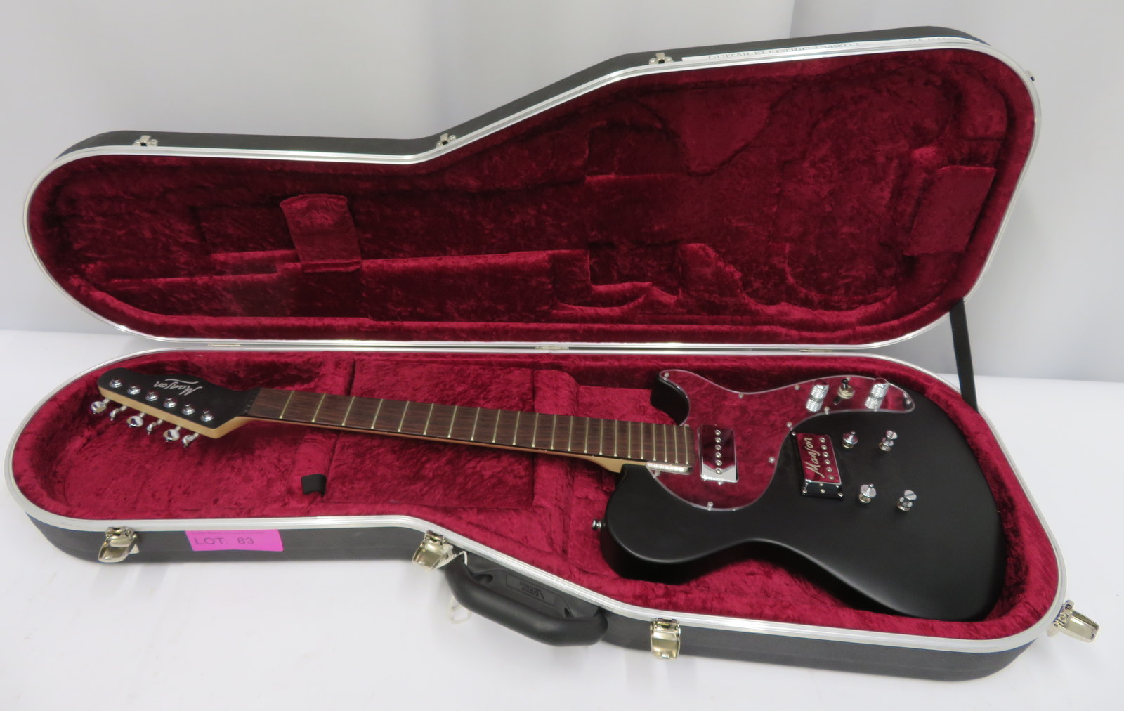 Manson electric guitar with hard case. Serial number: 1349211.