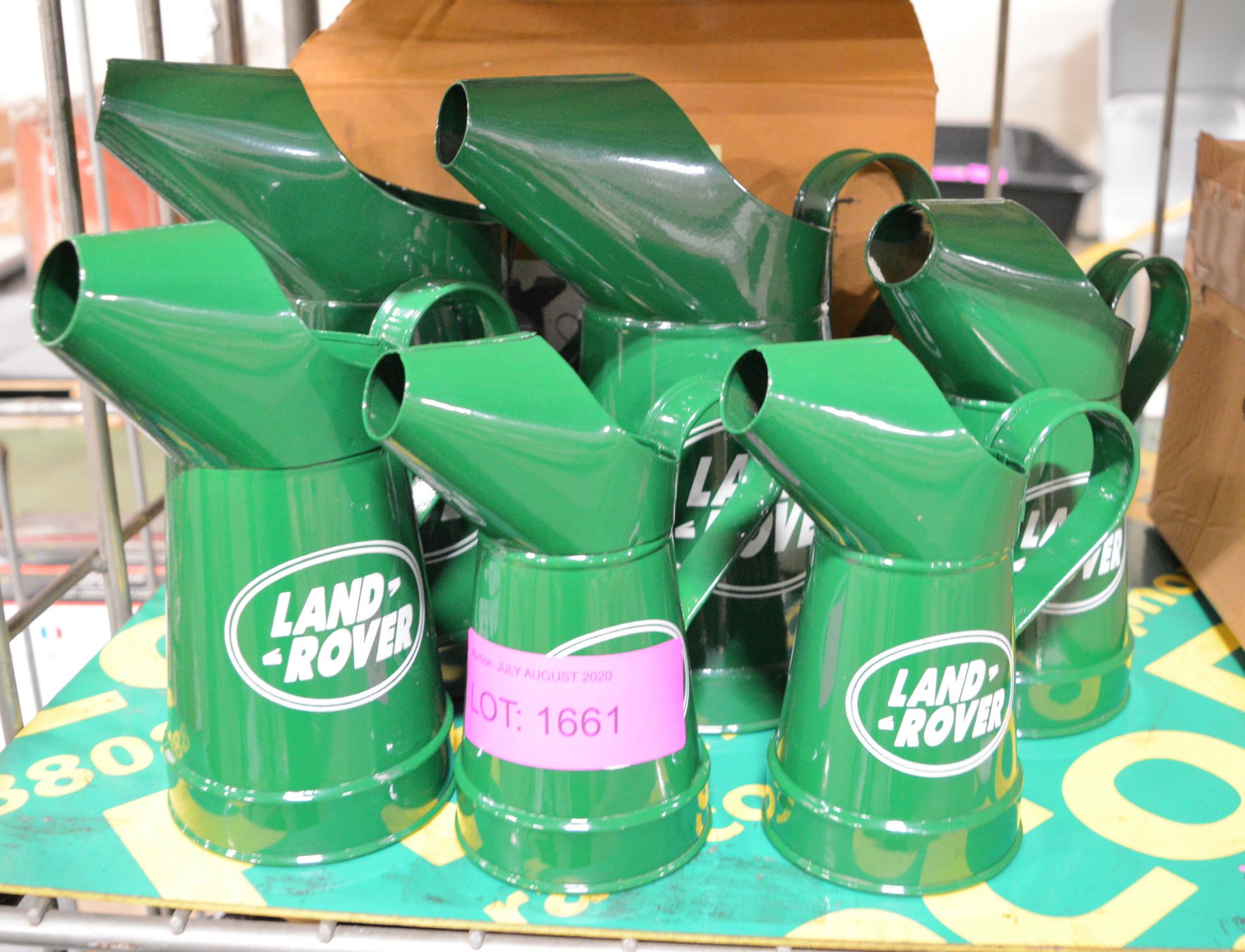 Set of 6 Land Rover Oil Cans.