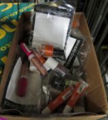 Various lip gloss and nail polish