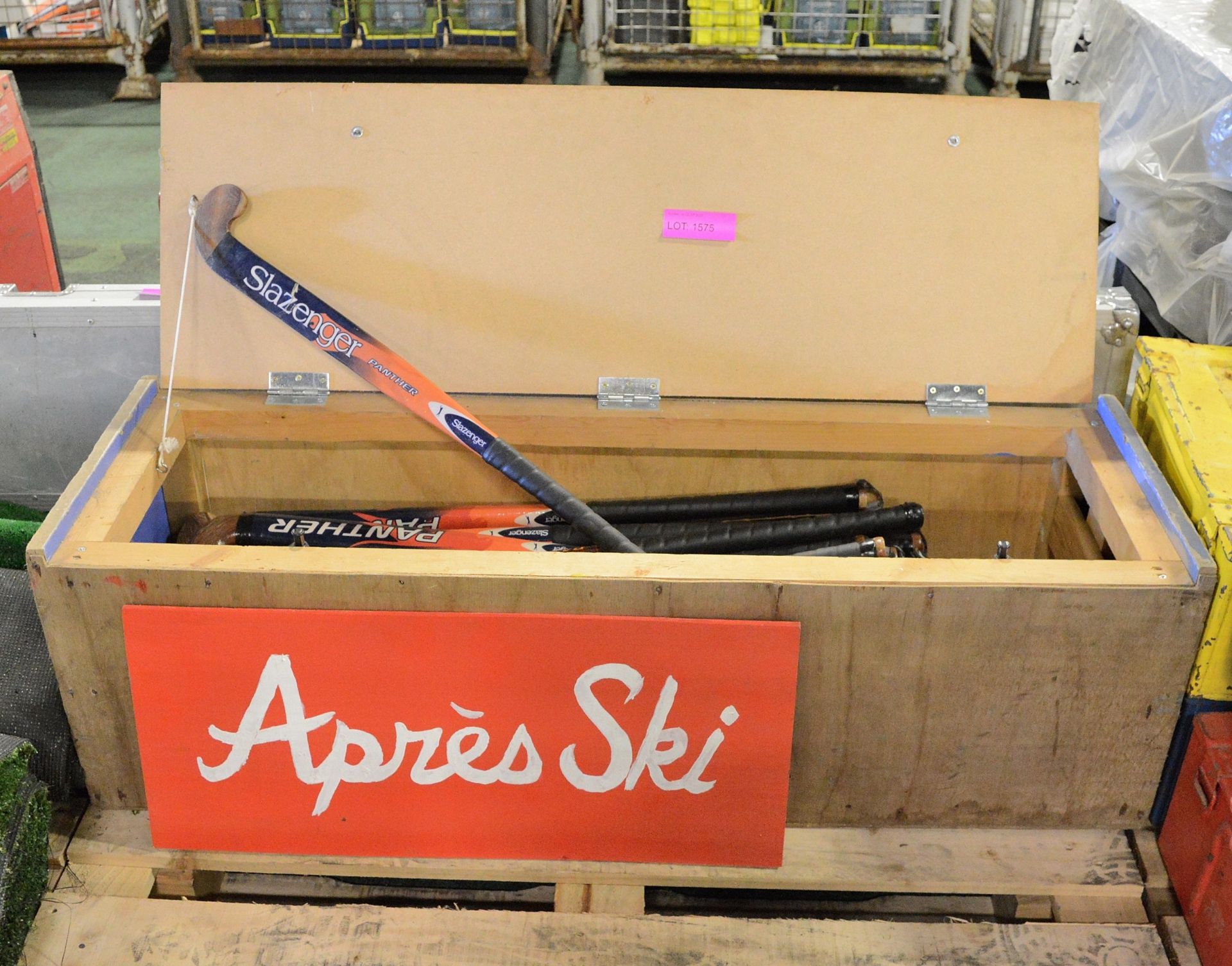 Slazenger hockey sticks in wooden storage box