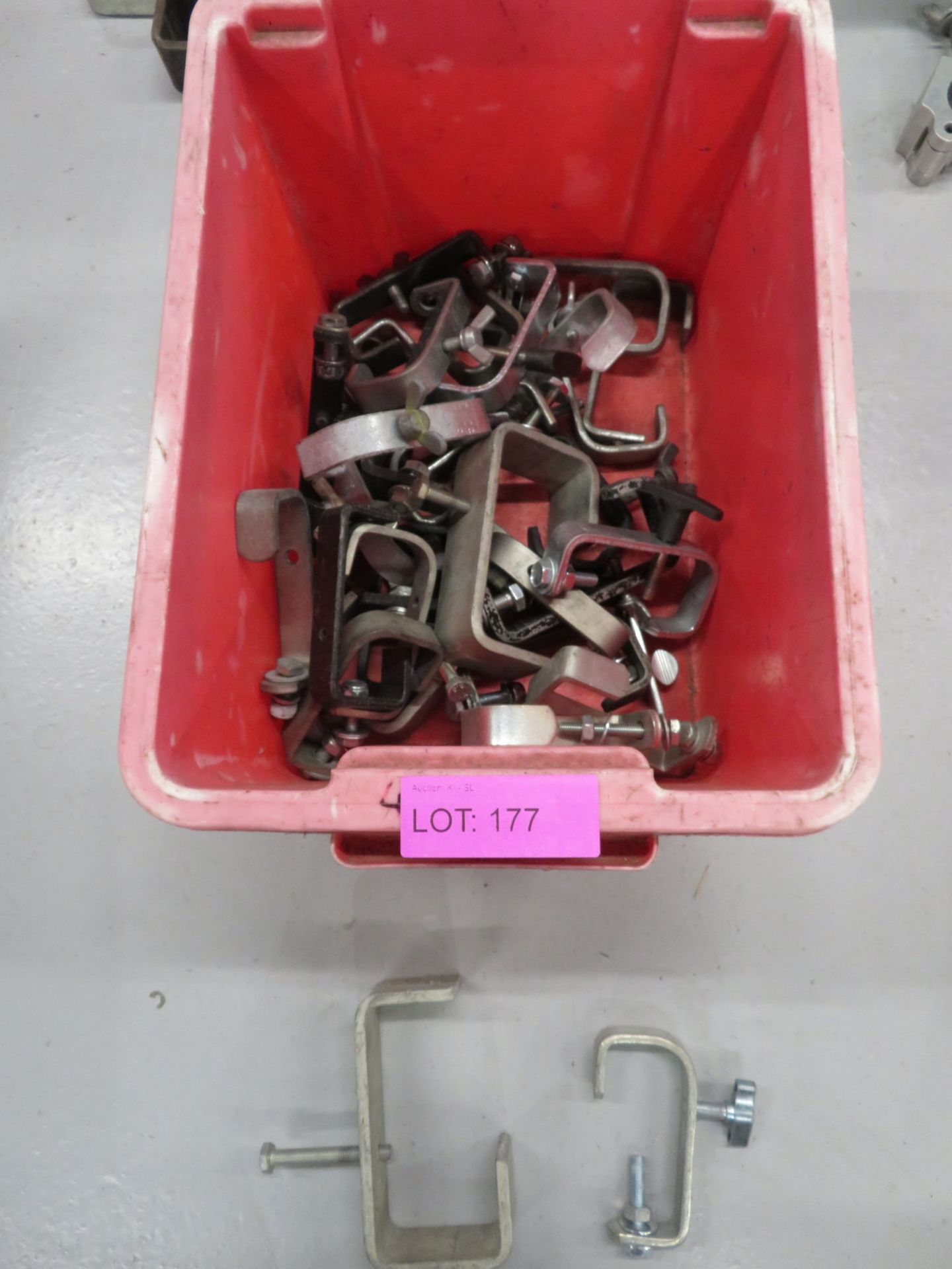 Box of various sized hook clamps.