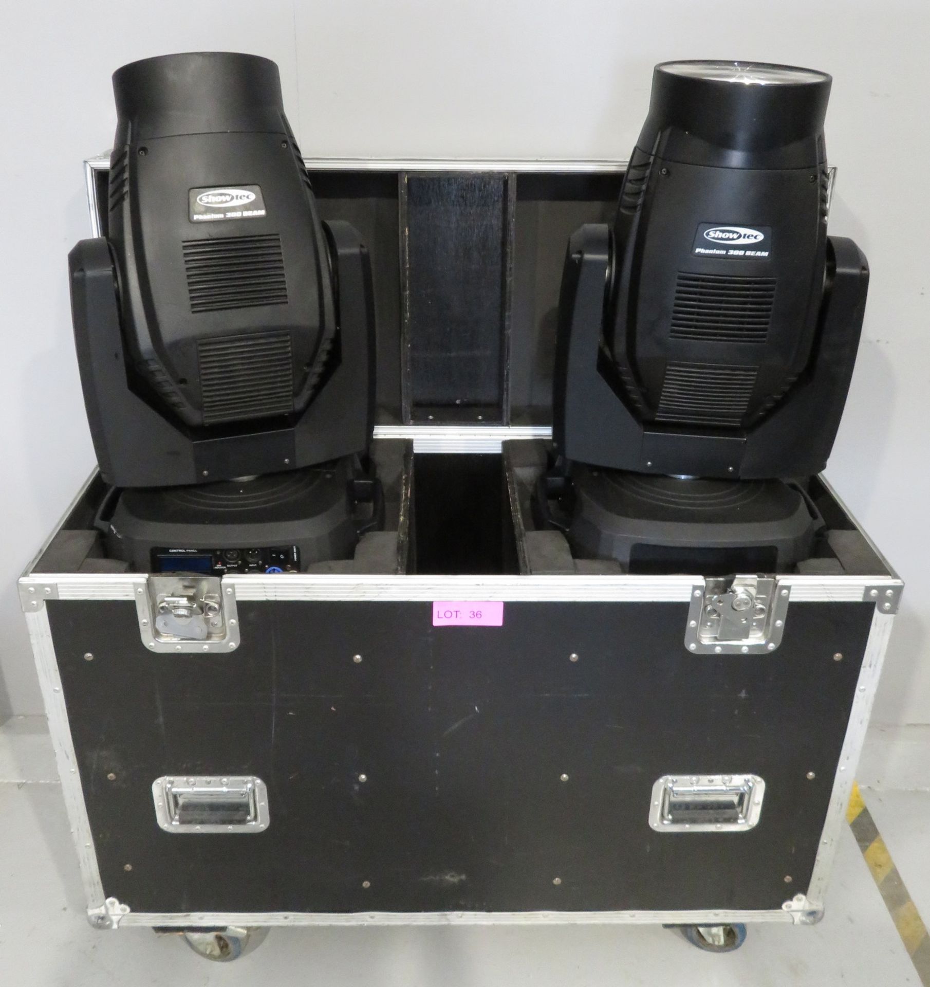 Pair of Showtec Phantom 300 Beams in flightcase. Includes hanging clamps and safety bonds.