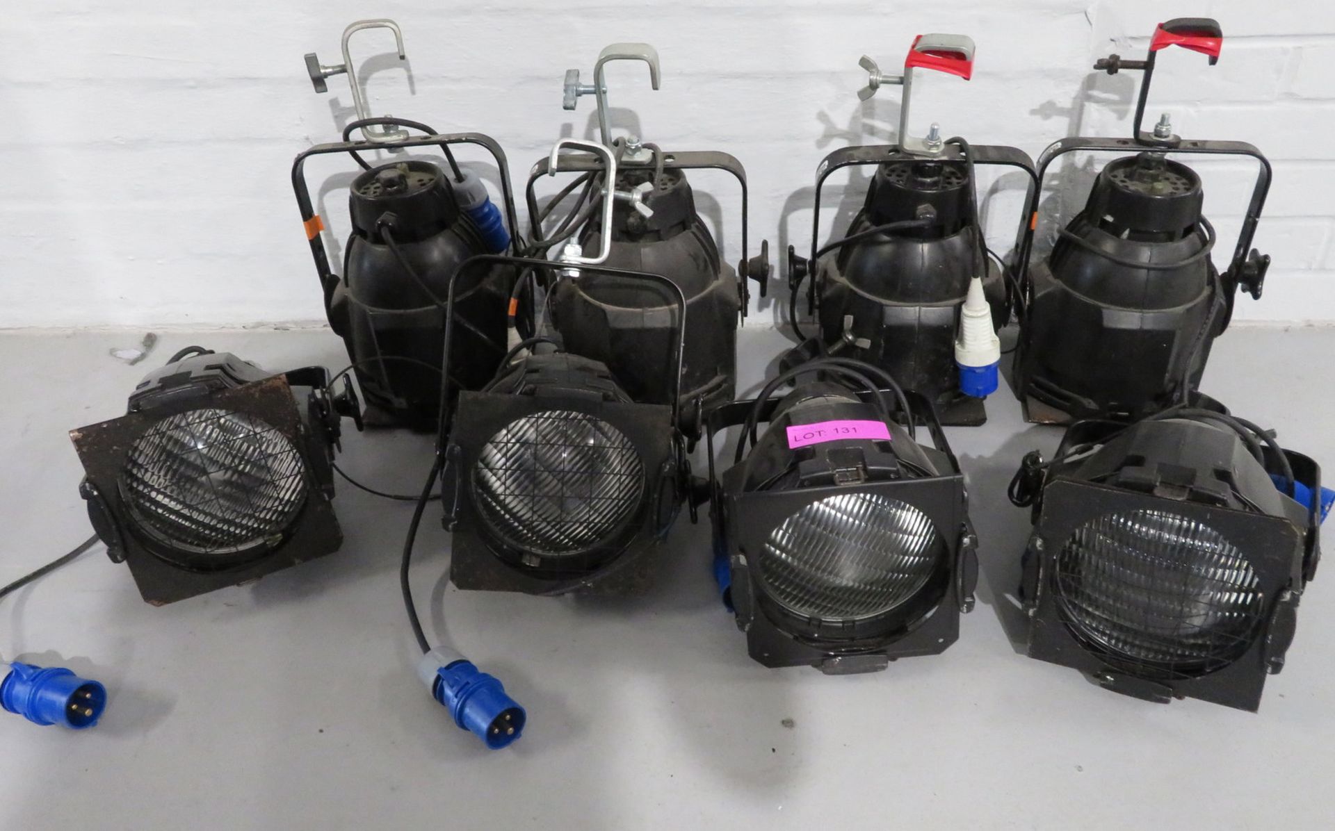 8x Black finished Par Can. Including hanging clamps and safety bonds. 6 Working condition,