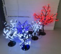 6x Artificial illuminating small trees. Includes case.