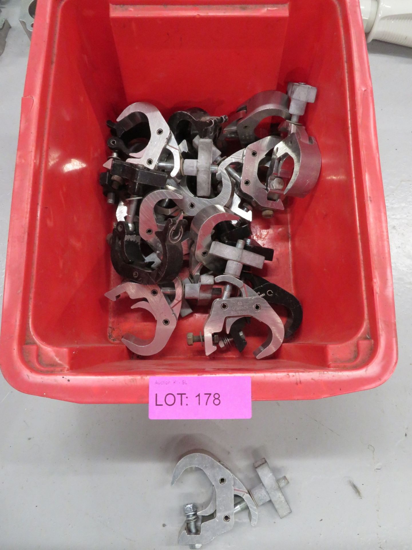 Box of silver and black quick clamps.