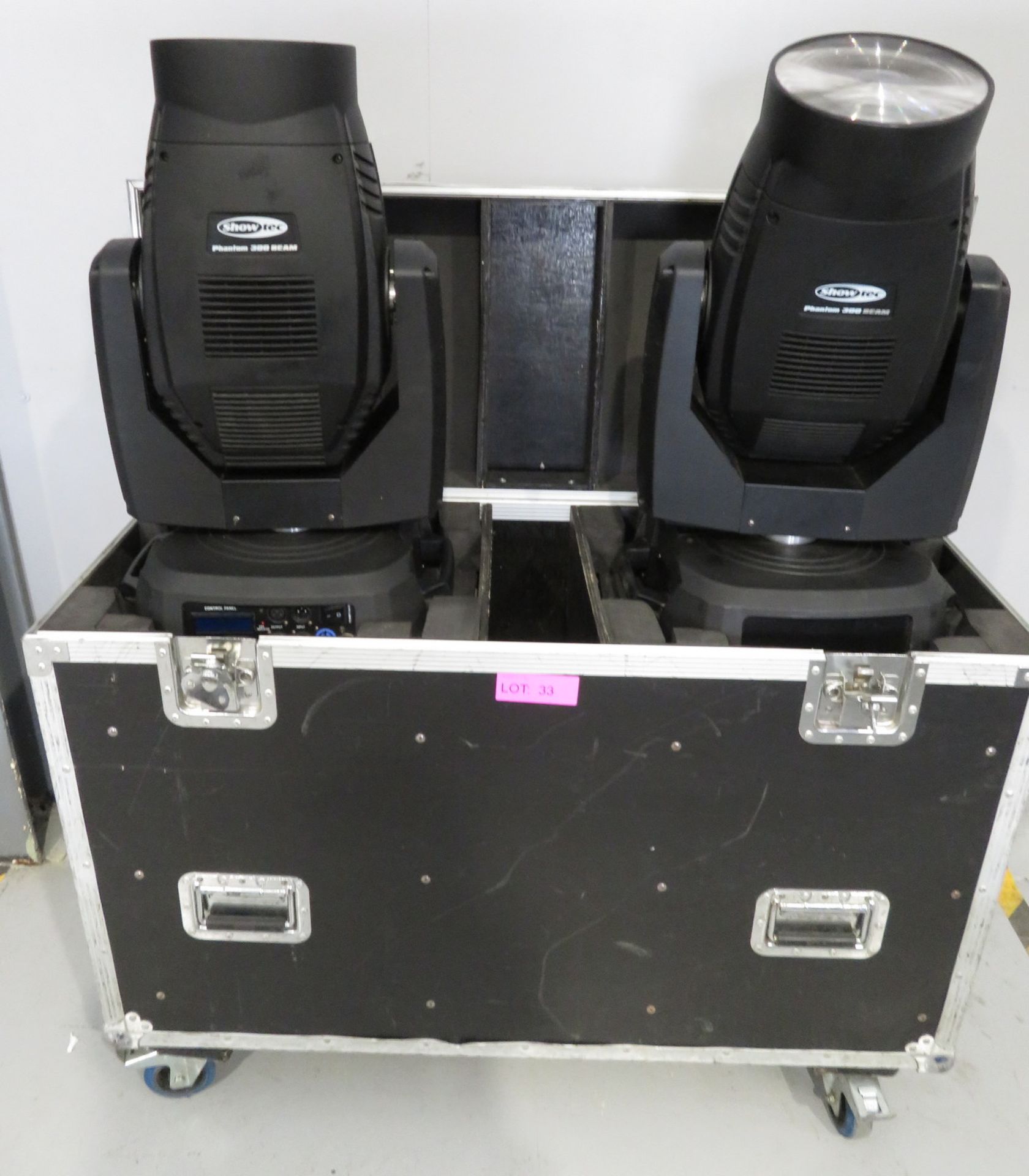 Pair of Showtec Phantom 300 Beams in flightcase. Includes hanging clamps and safety bonds.
