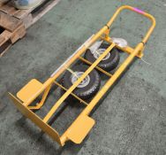 4 wheeled yellow sack barrow