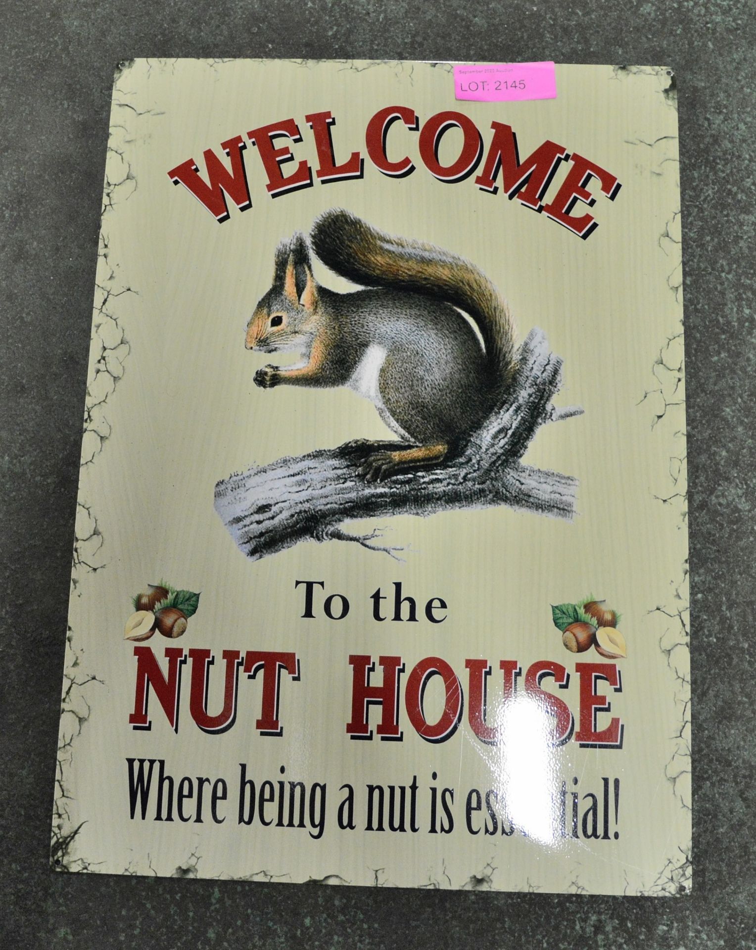 Nut house tin sign