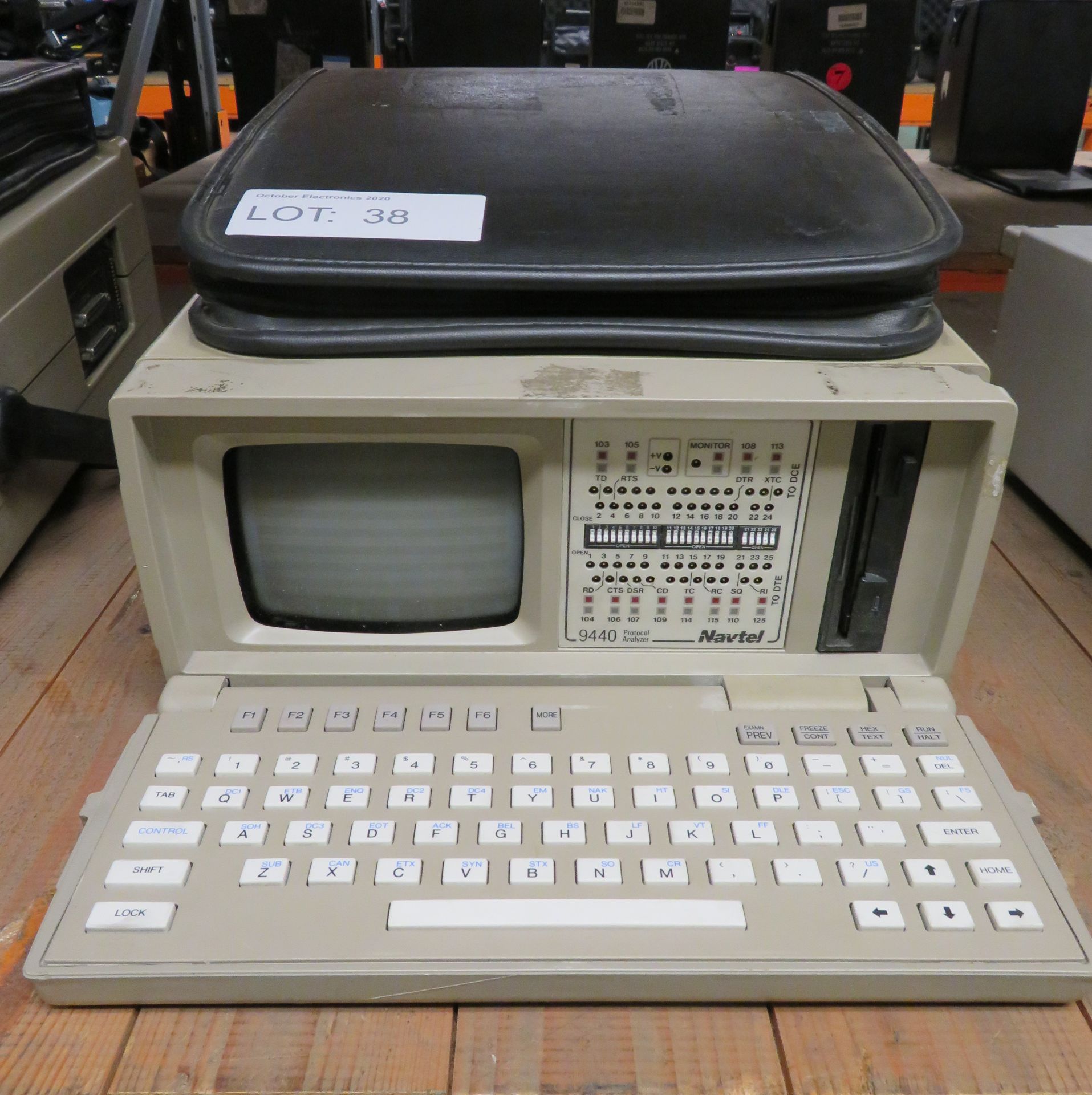 GN Navtel 9440 Protocol Analyzer, Some Damage on Top Right of Case.