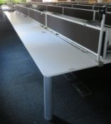 Bank Of Desks Seating 14. Dimensions: 9107x1800x745mm. (LxDxH)