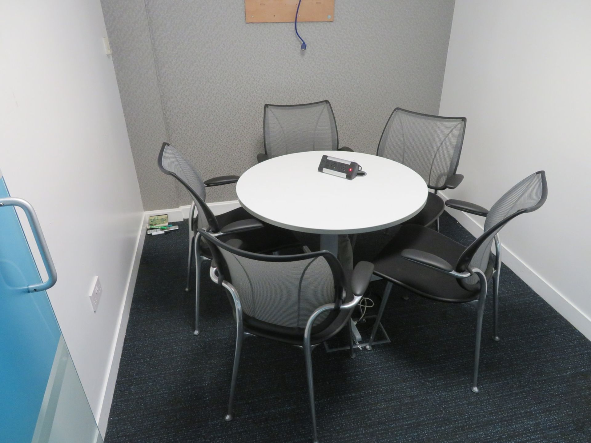 Meeting Room To Include Round Table And 5 Office Chairs.