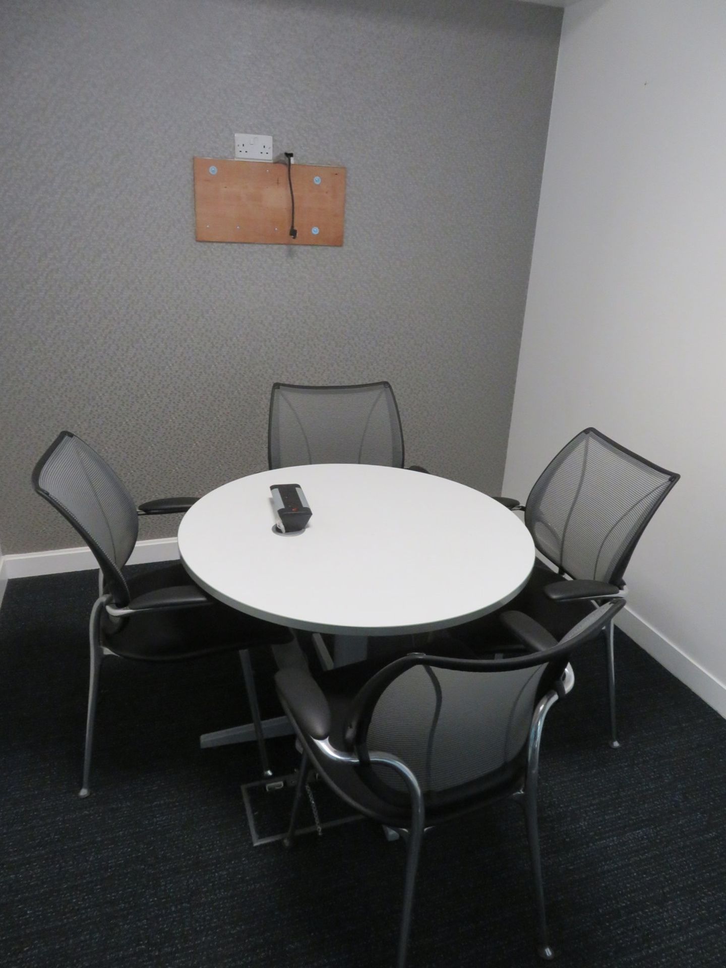 Meeting Room To Include Round Table And 4 Office Chairs.