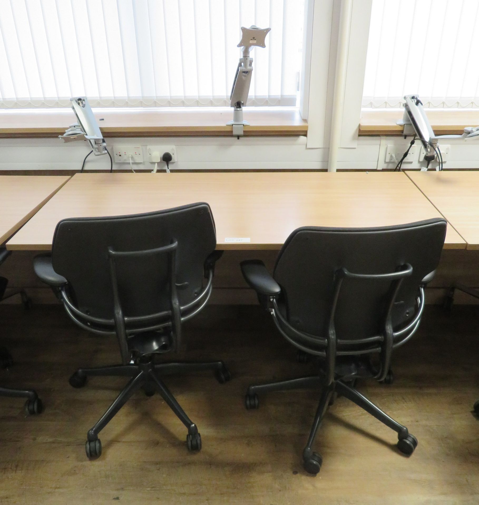 Tiltable Office Table & 2 Humanscale Freedom Office Chairs & Monitor Mounting Arms.