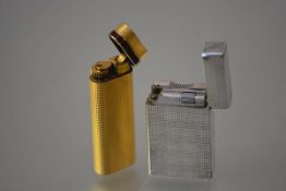 A Cartier gold-plated and enamel cigarette lighter, with textured finish, no. 97022P; together