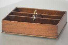 A 19th century mahogany housemaid's or cutlery box, in three sections with brass carrying handle.