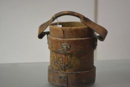 A canvas powder bucket, painted with the Garter Coat of Arms and with leather swing handle. Height