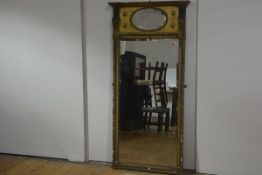 A Regency style gilt pier mirror, c. 1900, the crest with oval bevelled mirror plate against a