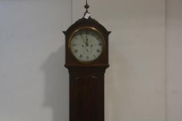 A George III mahogany cased drumhead longcase clock, early 19th century, the painted dial with Roman