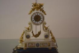 A French gilt-metal mounted alabaster drumhead mantel clock, late 19th century, the white enamel