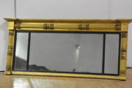 A 19th century gilt-composition tripartite overmantel mirror, the moulded cornice with projecting