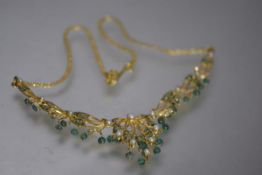 An Indian emerald and pearl necklace, mounted in yellow metal, probably high carat gold (