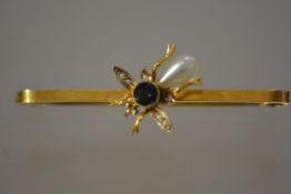 A 9ct gold amethyst and cultured pearl insect bar brooch, early 20th century. Length 46mm