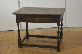 An early 18th century oak side table, composed of some period elements, the rectangular top with