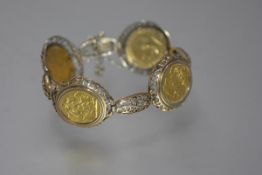 A gold sovereign bracelet, the four full sovereigns, Edward VII 1903 and George V 1912, 1925 and