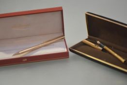 An Aurora Hastil silver-gilt fountain pen, with fluted body, stamped 925 and with 14ct gold nib,