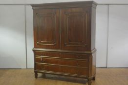 A large Napoleon III gilt-brass mounted linen press, 19th century, the upper section with moulded