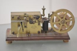 A rare French brass Morse code telegraphic ticker tape inker, c. 1900, with spring driven