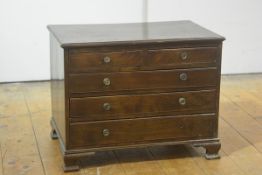 A small George III style table top mahogany collector's chest, the moulded rectangular top above two