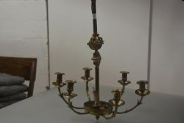 A gilt-brass six-light chandelier in 18th century style, part electrified, the standard with