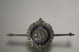 An 18ct white gold and enamel military sweetheart brooch for the Argyll & Sutherland Highlanders,