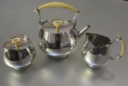 Douglas Carl Jessen Brown (Scottish, 1940-2016), a silver three piece tea service, Edinburgh 1962,