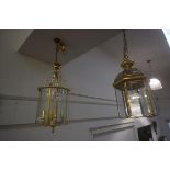A 19thc style brass hanging lantern, 61cm x 28cm, together with a small brass hexagonal lantern (2)