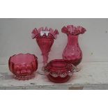 A group of four pieces of 19th/20thc cranberry glass