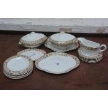 A dolls miniature part dinner set, comprising ashets, tureens, dinner plates and side plates
