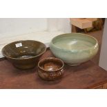 A Carolina M. Valvona large green glazed bowl, together with two brown bowls (3)