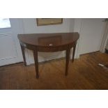 A pair of 19thc mahogany d-end tables, the plain tops with plain frieze, on square tapered supports,