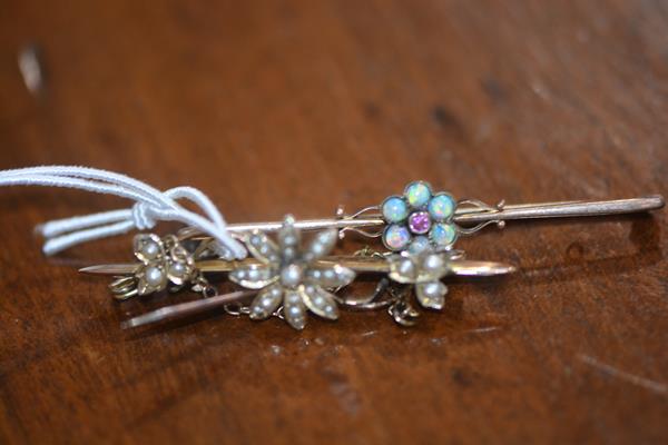 Two bar brooches, one set with seed pearls, the other with opals and garnet, marked 9ct