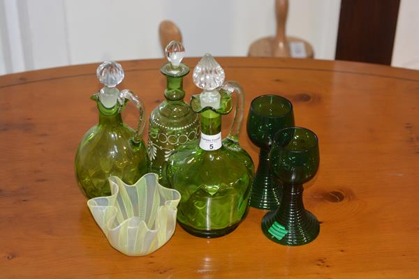 A mixed lot of coloured glass including oil bottles, glasses and a ribbon plate etc (a lot)