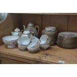A Japanese export egg shell teaset of eleven cups, saucers sugar, cream etc, some damage