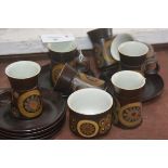 A Denby vintage coffee set of six cups, saucers, sugar and cream